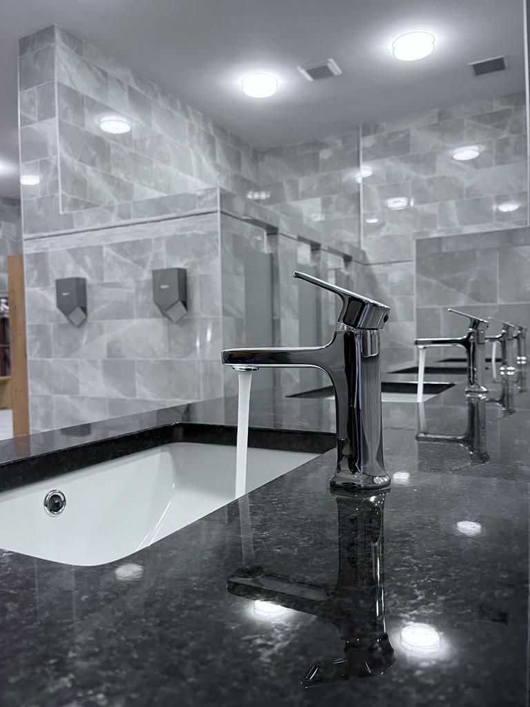 washroom with running tap water
